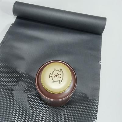 China New Hysen Pick 38cm*2m Space Saving Disposable Black Cushion Paper For Honeycomb Paper Tea Packing Sheet for sale