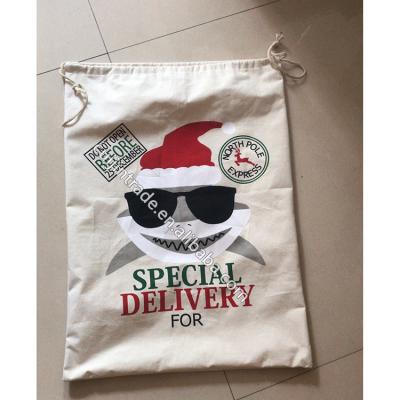 China Empty Canvas Shark Santa Sack 2021 New Arrival Christmas Gift Bag Monogram White Canvas Sunglass Personalized Wholesale Shark Santa Sack for sale