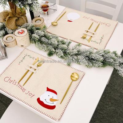 China Christmas Viable Table Heat Insulation Mat Linen Embroidered Santa Man Penguin Christmas Decorative Place Mat for sale