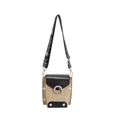 China High Quallity Spring small bag female 2022 new trendy net red wide shoulder strap simple small fresh straw messenger small square bag for sale