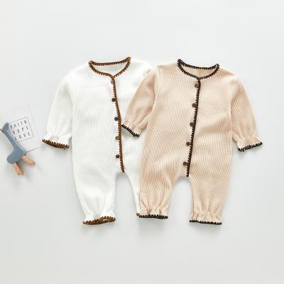 China Casual Long Sleeve Unisex Newborn Baby Premium Toddler Clothes Solid Color Baby Button Girls Bodysuit Plain Ribbed Baby Romper for sale