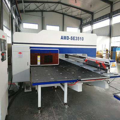 China Metal Sheet Stamping CNC Turret Angle Plate Punching Machine With Feeding Table for sale