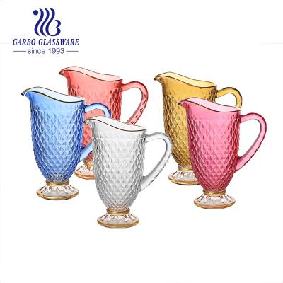 China Viable Jet Color With Gold Rim Water Jug Decorative Juice Glass Jugs With Big Handle And Stem Gold Fashion Drinking Pitcher for sale