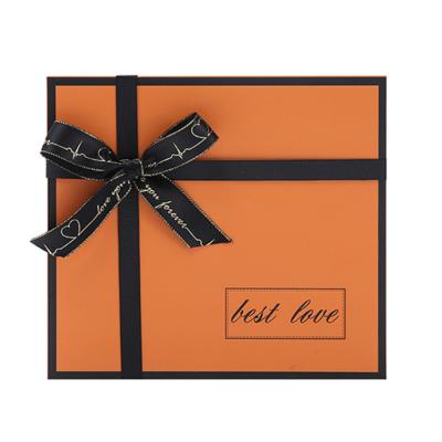 China Recycled Materials Business High End Upper Lower Bow Orange Gift Box Large In Stock, Razor Wallet Belt Packaging Box Wholesale for sale