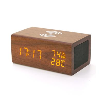 China Wireless Charger for Mobile Phone 2021 3 in 1 Wooden Speaker Wireless Charger LED Display Charging Alarm Clock for sale