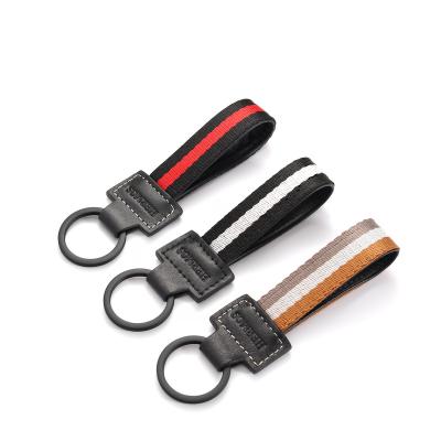 China Promotional high quality metal car keychains fashion metal leather keychains with metal key ring for gifts for sale