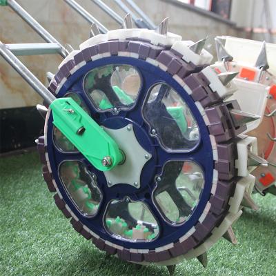 China Adjustable Soybean Hongxing Depth Maize Soybean Hand Push Seeders Transplanters Machine for sale