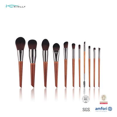 China El maquillaje de madera de aluminio de la manija de la virola 11PCS cepilla el pelo de nylon suave en venta