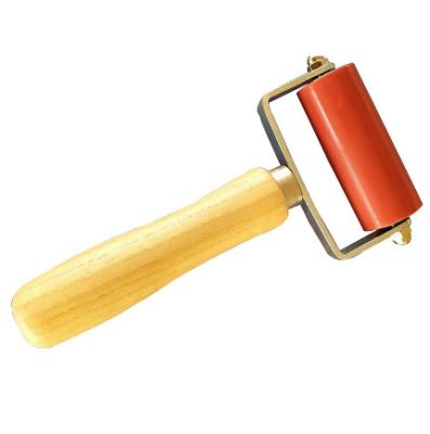 China 80mm red color handle removal pressure fiber firestone silicone wood seam paint/cleaning roller for pond liner for sale