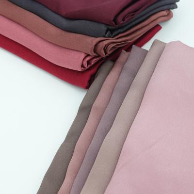 China Muslim Islamic Lady Shinny Scarf Hijabs Matte Scarf Pure Color Arab Popular Simple Bubble Satin Shawl for sale