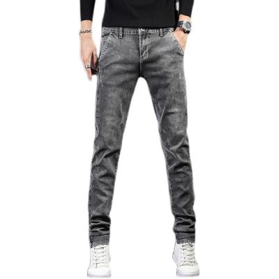 China New Autumn Men's Casual Slim Fit Jeans OEM High Quality QUICK DRY Men's Small Feet Denim Pants Slim Stretch Jeans Men for sale