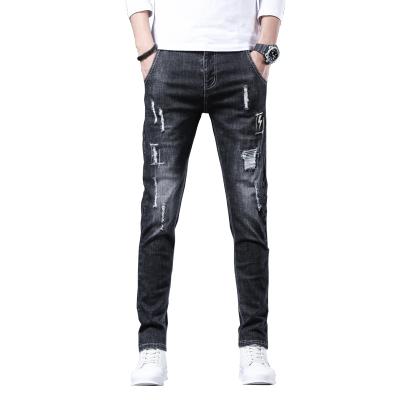 China Hot sale color men's jeans slim fit QUICK DRY ripped pants fashionable men's Korean style stretch pants for sale