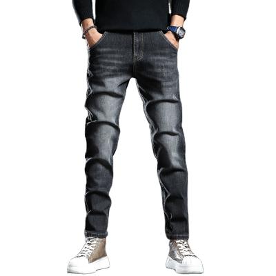 China QUICK DRY custom made men's jeans slim fashionable youth long pants Korean style small leg stretch fit straight pants men for sale