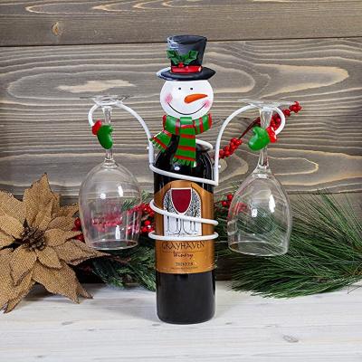 China Viable Holiday Snowman Wine Bottle and Stand Christmas Decoration Wine Glass Rack and Wine Glass Rack for sale