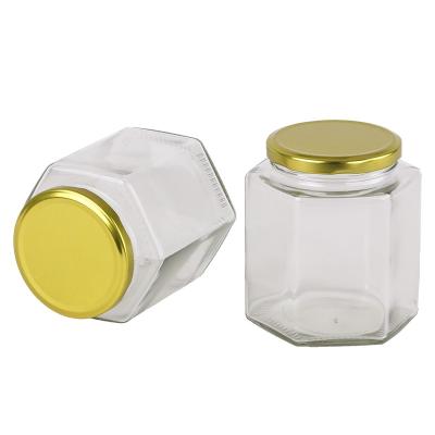 China Mini Custom 1.5oz 45ml Glass Microwavable Honey Jar With Gold Metal Lid For Food Packaging for sale