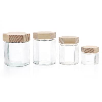 China Food Grade 9OZ 500G Clear 9OZ 500G Stocked Hexagonal Glass Candy Jar Storage Jar With Bamboo Lid for sale