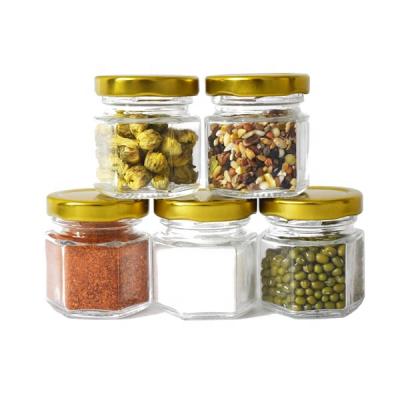 China Candy Storage Mini Sample Jar 1.5OZ 2OZ Hexagonal Glass Honey Jar With Lid For Jam Spice for sale