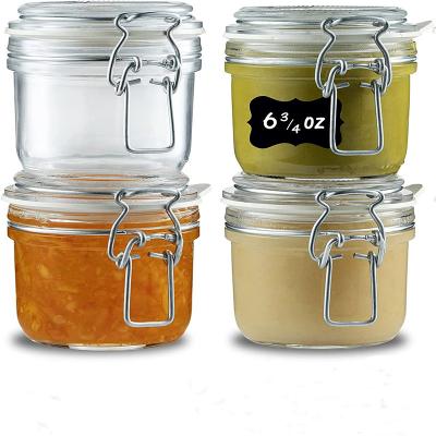 China Custom Wide Mouth 4oz 100ml Empty Chinese Glass Spice Jar With Stainless Steel Clip Glass Lid For Herbs for sale