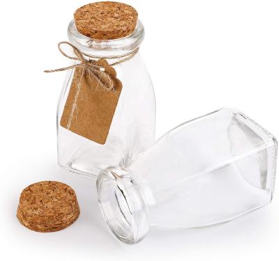 China Recyclable Empty Glass Candy Bottle Jars Baby Food Square 100ml 4OZ Dairy Milk Bottle Yogurt Jars With Cork Lid for sale