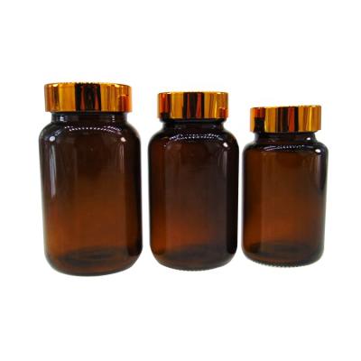 China 250ml Amber Pill Troche Glass Bottle Recyclable Medicine Bottles Custom Glass Round for sale