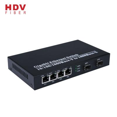 China Port 4 Gigabit Ethernet QoS Switch Fiber Optic Transceiver Switch and 2 SFP Ports 1000M for sale