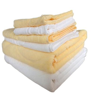 China Compressed 100% Cotton Embossed Logo Super Soft Hotel White Face Towel for sale