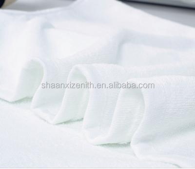 China Compressed Stock Lot Bulk Clearance Bath Towel / Airline Surplus White Cotton Towels for sale