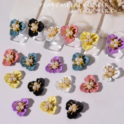 China Fashion Nail Art Three Petal Flowers Pearl Jewelry Nail Accessories Combine Spray Paint Metal Nail Decoration for sale