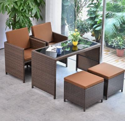 China 5 Piece Pe Rattan Furniture Dining Tables And Chairs Aluminum Waterproof Outside Patio Lounge Outdoor for sale