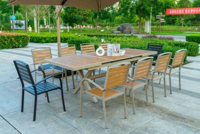 China 11 Pieces Outdoor Patio Furniture Plastic Wood Expandable Aluminum Garden Table And 8 Chairs for sale