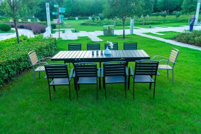 中国 Black 11 Pieces Plastic Wood Modern Outdoor Garden Furniture Table Set 8-10 Seater Extendable Patio Dining Table Chairs 販売のため