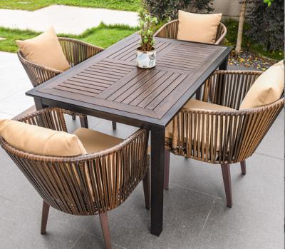 China Outdoor Table And Chair Villa Courtyard Garden Leisure Terrace Plastic Wood Table Combination Of Outdoor Rattan Table for sale