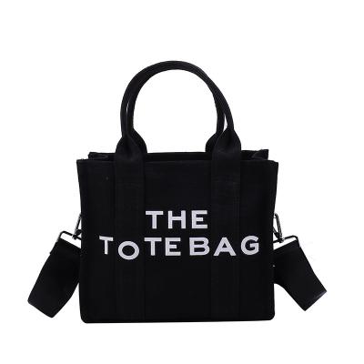 China Eco-friendly Wholesale custom logo Canvas Handbag Simple Fashion Single Shoulder tote bag with printed for sale