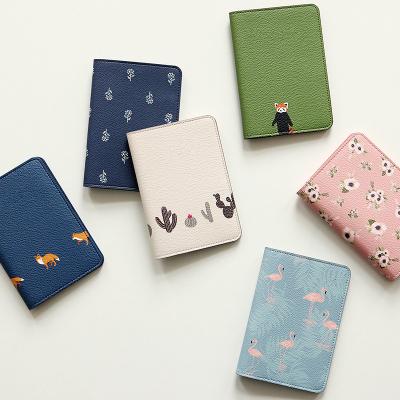 China Korean version passport holder small travel passport holder cartoon card bag short ticket holder Korean document bag PU bag for sale