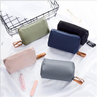 China Fashion Water Proof Ladies Black Pink White Frosted PVC Makeup Wash Zipper Small Toiletry Travel Cosmetic Bag for sale