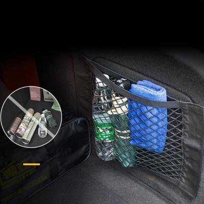 China New China-chic 1 piece of universal sticker mesh wall mesh car storage elastic nylon car cargo bag. for sale