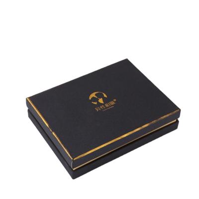 China Wholesale Aseptic Luxury Custom White Cardboard Gift Magnetic Clothing Packaging Box With Ribbon for sale