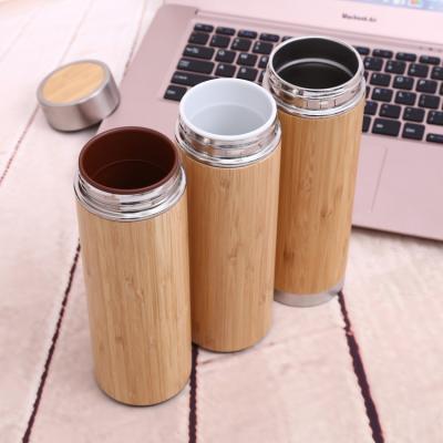 China Double Wall Bamboo Water Bottle Insulated Stainless Steel Wood Grain Water Bottle for sale