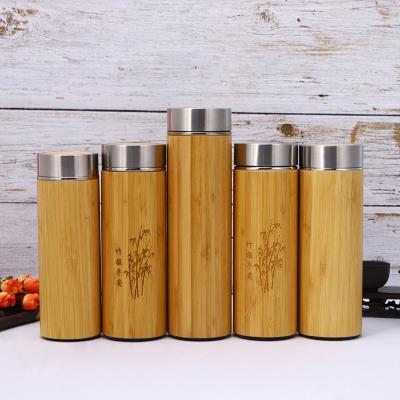 China Manufacturer Custom wood grain water cup Double Wall Insulated thermo Stainless Steel bamboo hot water bottle for sale