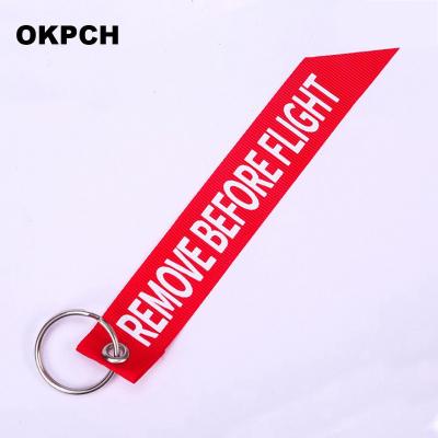 China Embroidered Flight Woven Red Chain Key Ring Special Luggage Tag Label Key Chain For Aviation Gifts OEM Key Chain for sale