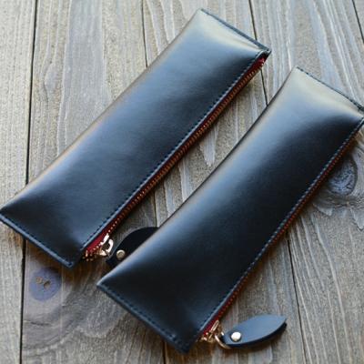 China Gift Fashion Black Genuine Leather Pencil Case Zippered Pen Case Stationery Bag Zipper Pocket Pencil Holder for sale