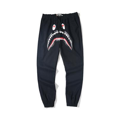 China 2022 QUICK DRY Hot Selling Bape Pants Solid Color Black Youth Lightly Printed Casual Pants Men's Drawstring Plus Size Pants for sale