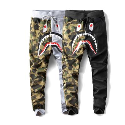 China 2022 Bape QUICK DRY shark pants youth fashion loose hot sale unisex casual men and women printing slim camouflage trousers for sale