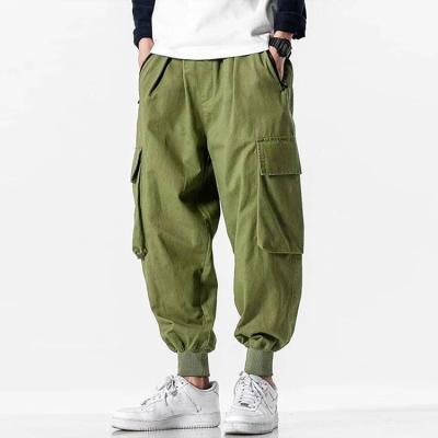 China Custom Mens Skinny Pockets Mens Breathable Wave Side Zip Joggers Pants Mens Cotton Cargo Pants for sale