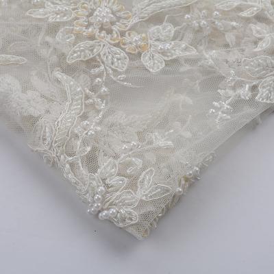 China Sustainable Fashion Pearl Beaded Handmade Embroidery Lace Fabric for sale