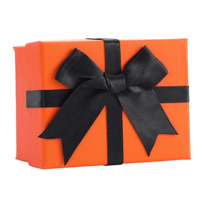 China Recycled Materials Customized Mult-colored Creative Logo Printing Portable Gift Boxes Paper Gift Boxes With Ribbon for sale