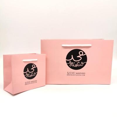 China Recycled Materials Wholesale Cheap Price Luxury Custom Craft Printed Shopping Paper Bag Brand Gift With Your Own Logo for sale