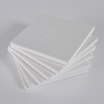 China Sustainable Wholesale White Blank Custom Shape Ceramic Coasters Personalized Funny Coasters for sale