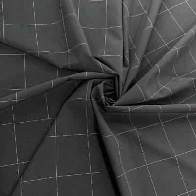 China Four Way Stretch Plaid Jacquard Textured Fabric 91% Nylon 1% Polyester 8% Spandex for sale