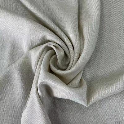 China Soft Cotton Like Jacquard Textured Fabric For Clothing Weft Stretch Slub Twill Fabric for sale